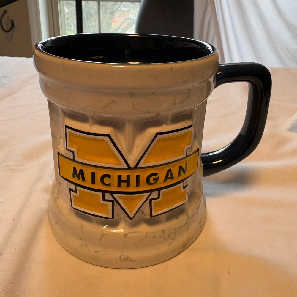 Michigan Ceramic Coffee Mug with Yellow Crest and BlueHandle